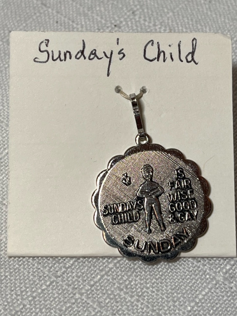 Sarah Coventry "Sunday's Child" nursery rhyme pendant charm from 1976. Vintage